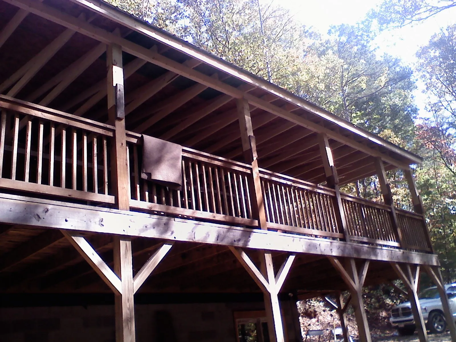 Timber framing under a new elevated porch and deck — Roof Leak Repair in Dighton by Roofing Brothers
